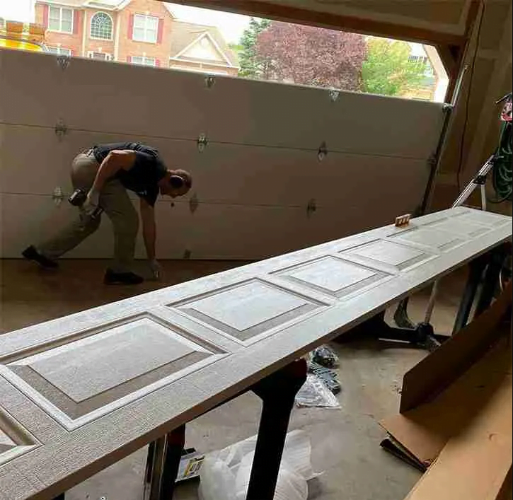 replacing garage door panel